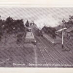 578 postcard. express train dashing through to melbourne